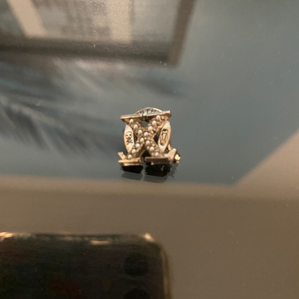Chi Omega sorority pin